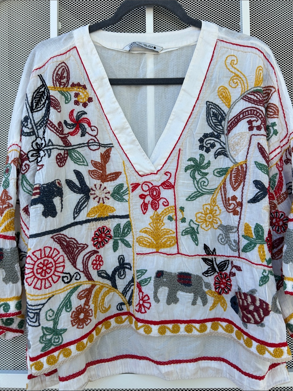 Embroidered V-Neck Boho Top - White with Multicolor Folk Motif - Picture 2 of 7